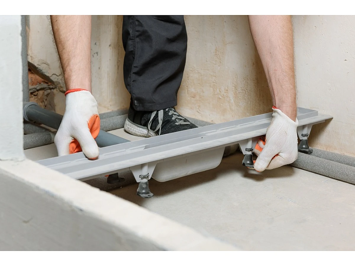 Как установить трап для душа